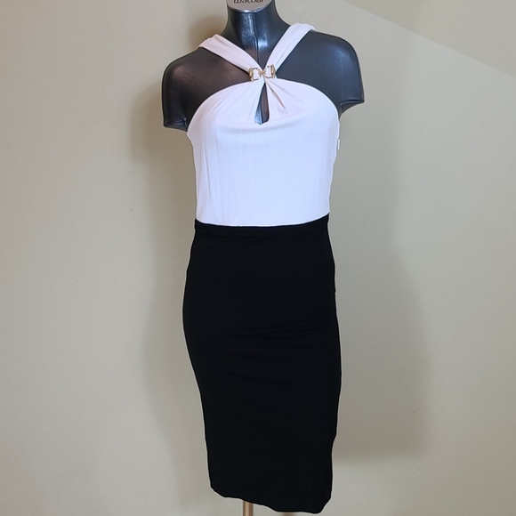 Gucci Dresses & Skirts - Gucci couture black and white dress size M